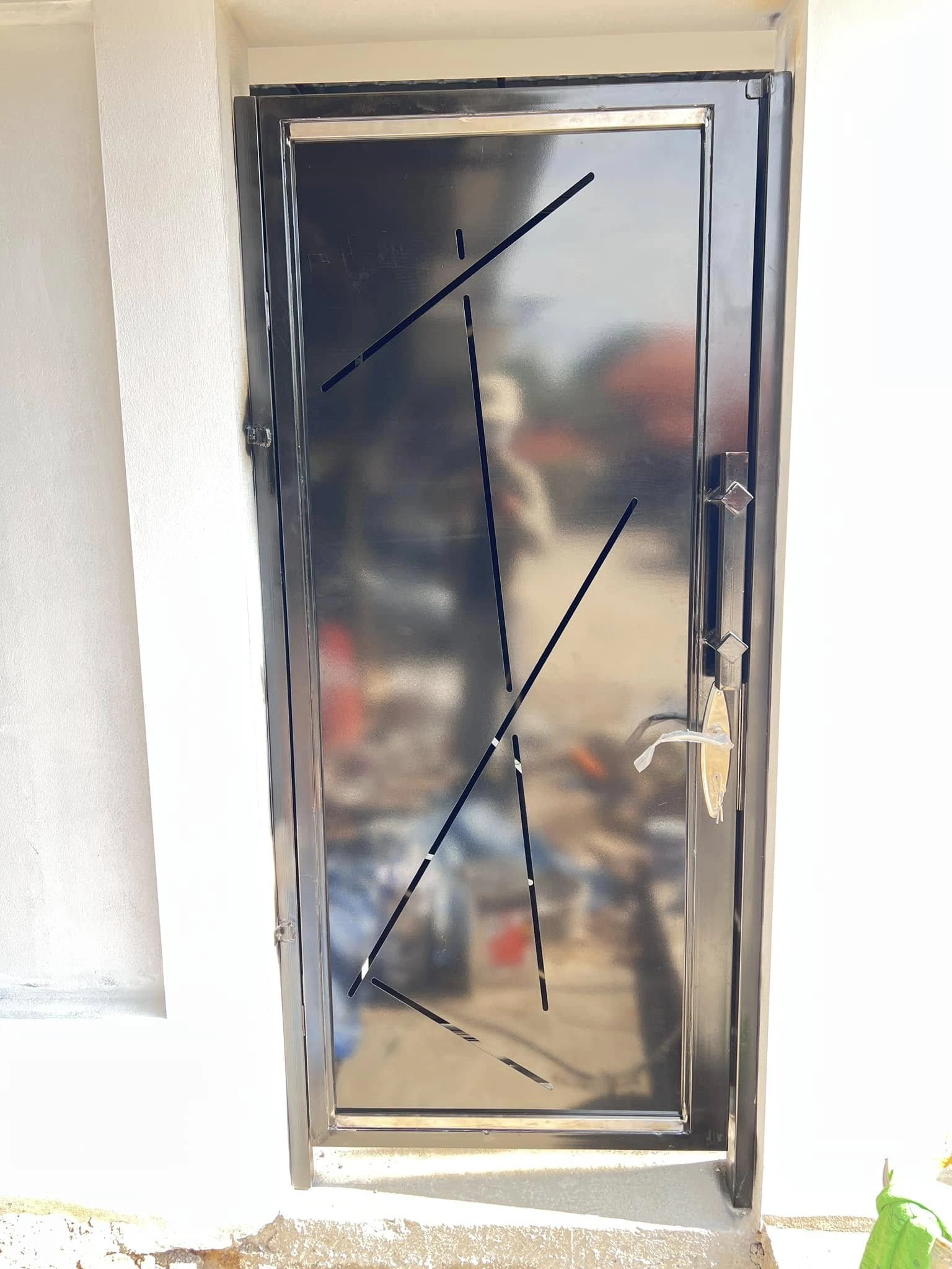 งานประตูเหล็กแผ่นลายฉลุ