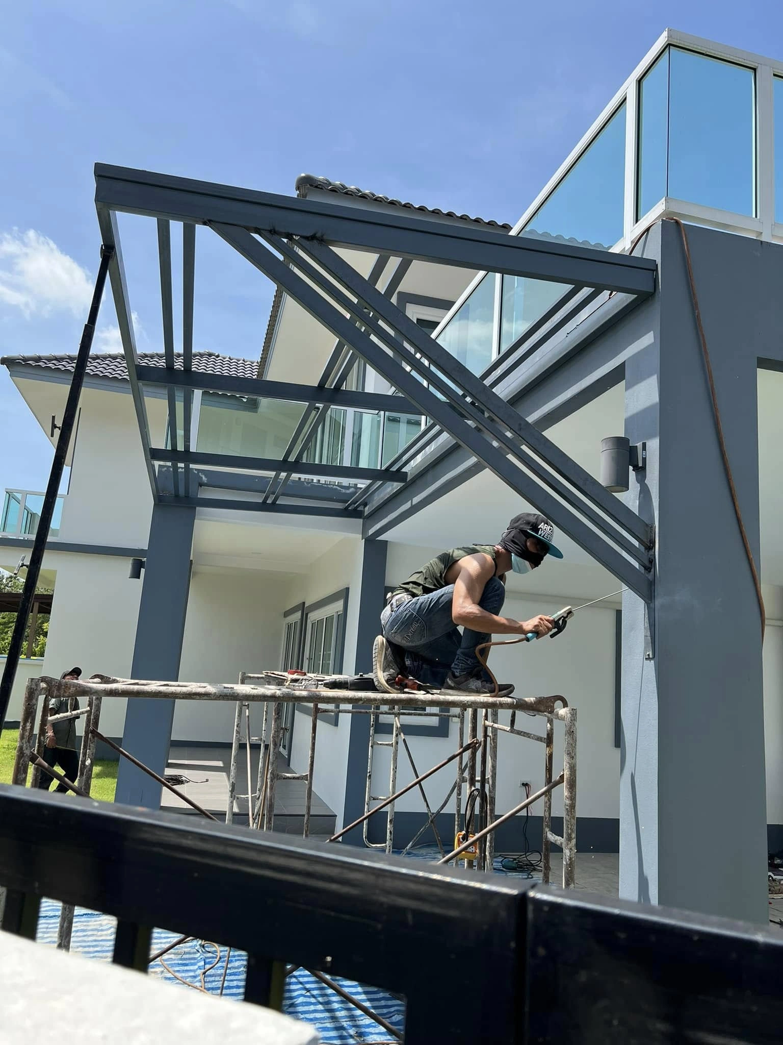 ผลงานกันสาดหลังคาเหล็ก